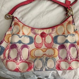 Coach hobo purse will need a new strap shown